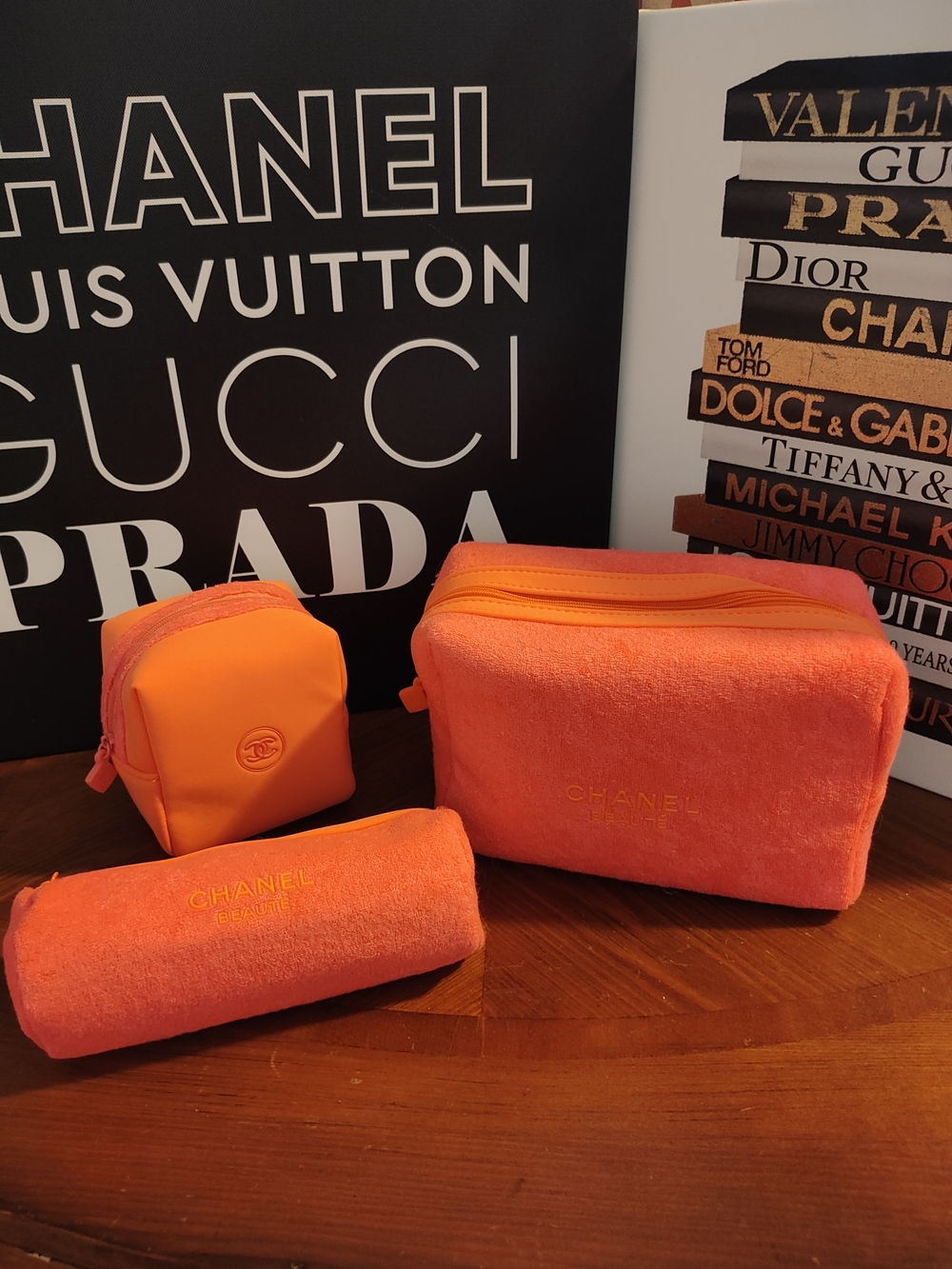CHANEL Coral-Orange Three-Piece Cosmetic Pouch Set